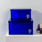 boîtes rangement transparentes géométriques réutilisables poignées minimaliste respectueux environnement pliables