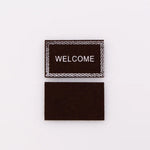 tapis d'entrée marron gris rose motif géométrique adhésif classique