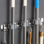 porte balais argenté vert clair adhésif mur moderne hooks rangement outils nettoyage