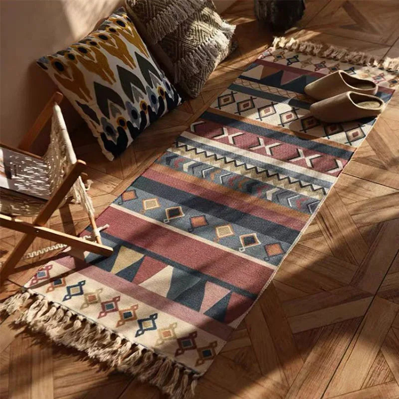 tapis boho chic motifs géométriques beige bleu orange franges extérieur plage