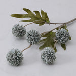 décoration intérieure moderne bouquet artificiel rose blanc violet boules fleurs feuilles vertes mariage anniversaire