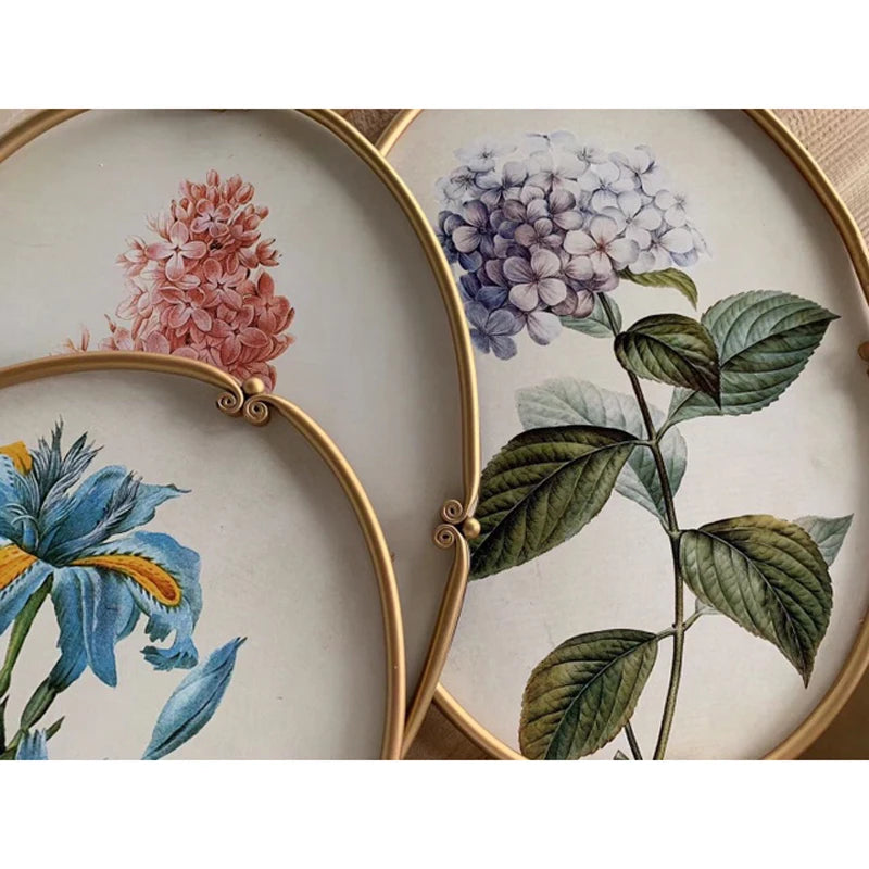 tableaux ovales vintage illustrés fleurs botaniques cadre doré élégantes décoration murale ancienne chambre salon