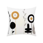 housse coussin brodée géométrique moderne fleur abstraite couleur beige blanc vert jaune décoration intérieure