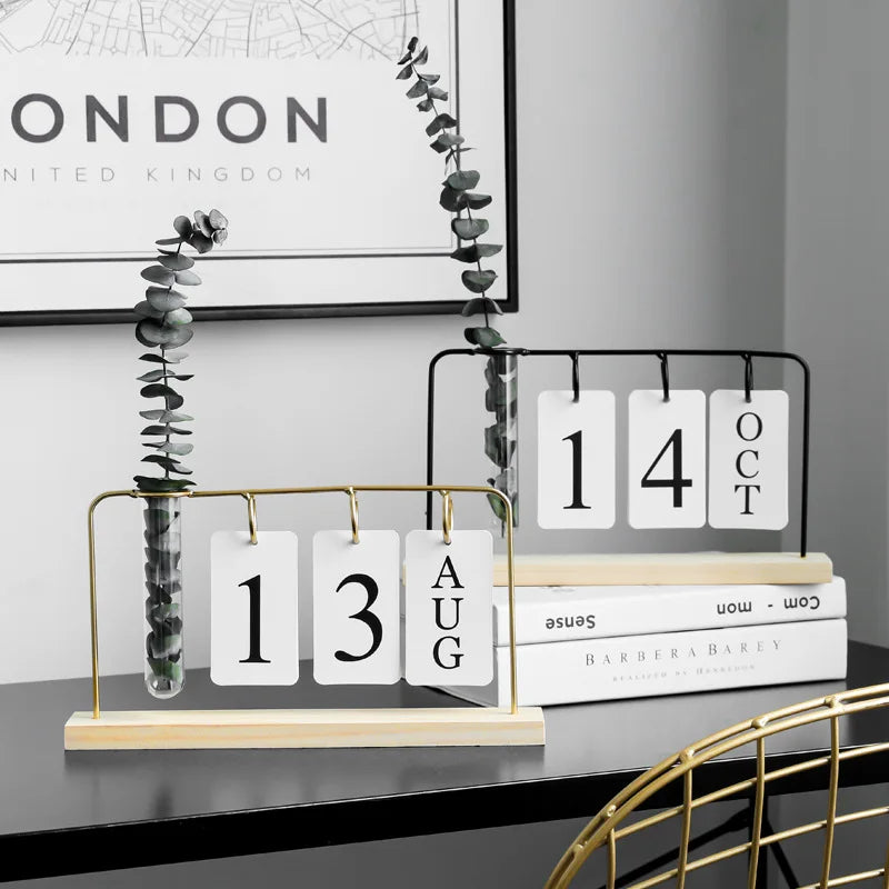 calendrier mural moderne minimaliste noir blanc vase transparent plantes cartes dates support métallique bois