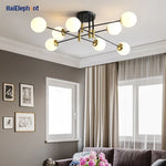 lampe suspension moderne noir doré sphères translucides led restaurant chambre salon