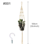plante suspendue macramé décoratives boho artisanale pot fleur blanc anneaux métalliques decoration murale cour
