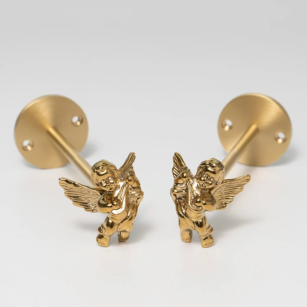 pince rideau dorée insectes anges détails sculptés quincaillerie fenêtre vintage opaques