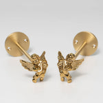 pince rideau dorée insectes anges détails sculptés quincaillerie fenêtre vintage opaques
