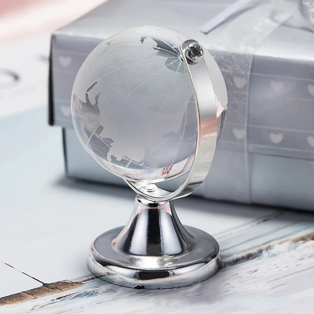 globe terrestre cristal transparent relief continents support métallique or argenté décoration élégante enseignement enfants