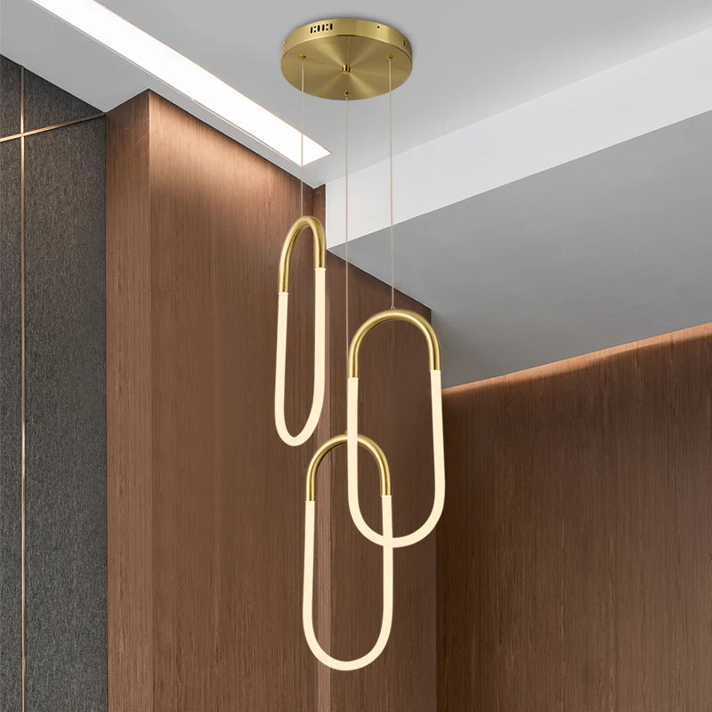 suspension lumineuse moderne or blanc pince papier finition lisse minimaliste salon chambrehôtel