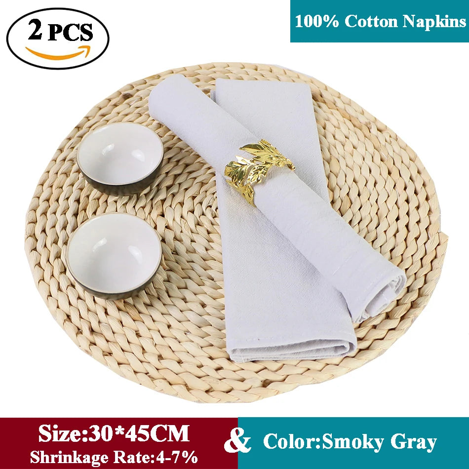 Serviettes en coton 100% de couleur grise fumée, de taille 30 x 45 cm, avec un taux de rétrécissement de 4 à 7%.