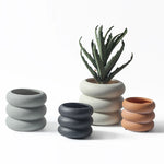 cache pot céramique moderne gris orange texture granuleuse fleur plante intérieure contemporain minimaliste