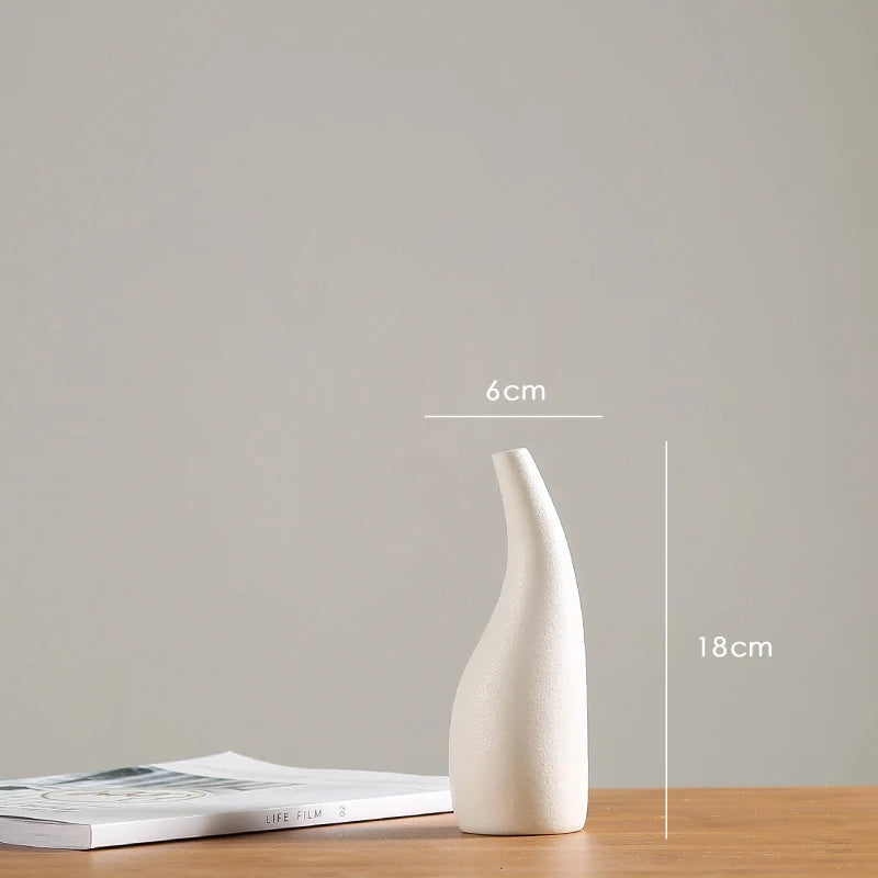 vases blancs modernes minimalistes céramique opaques fleurs artificielles table simple