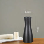 vases blancs modernes minimalistes céramique opaques fleurs artificielles table simple