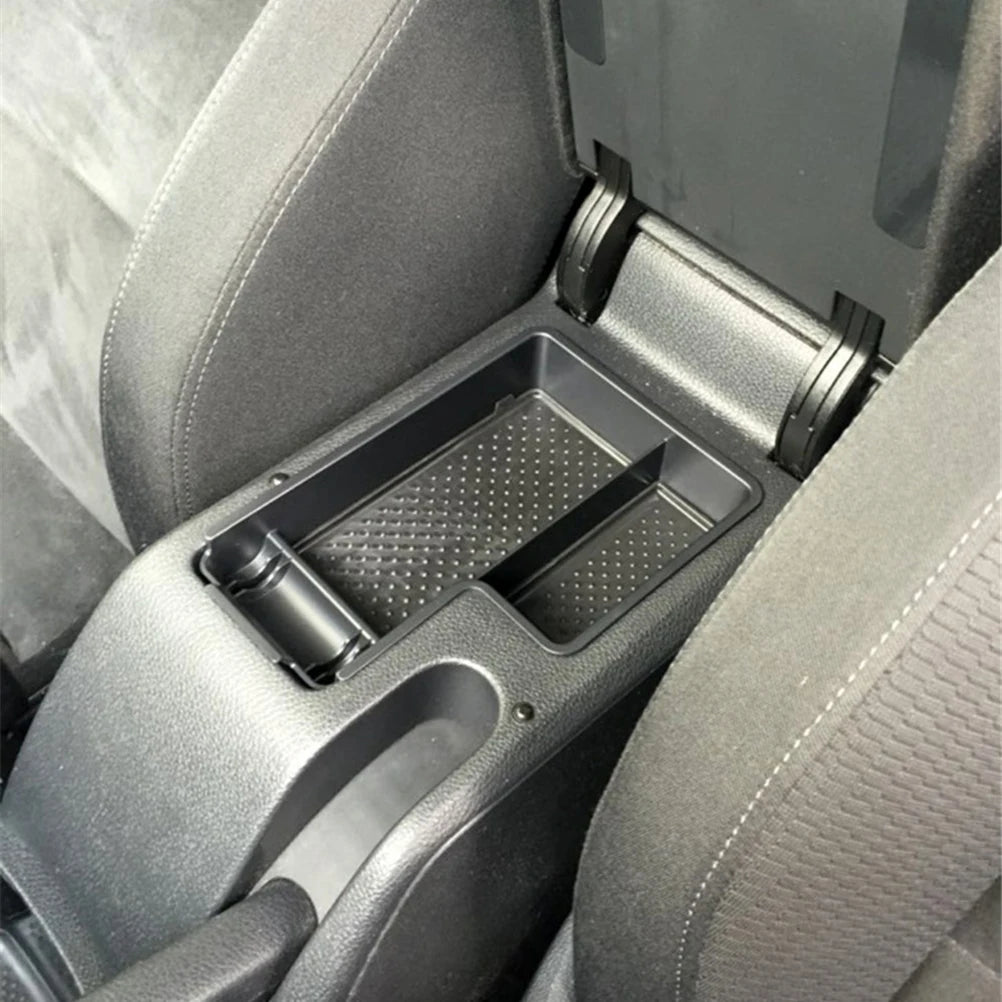 organisateur console centrale auto noir texturé alvéoles compartiment incurvé support téléphone