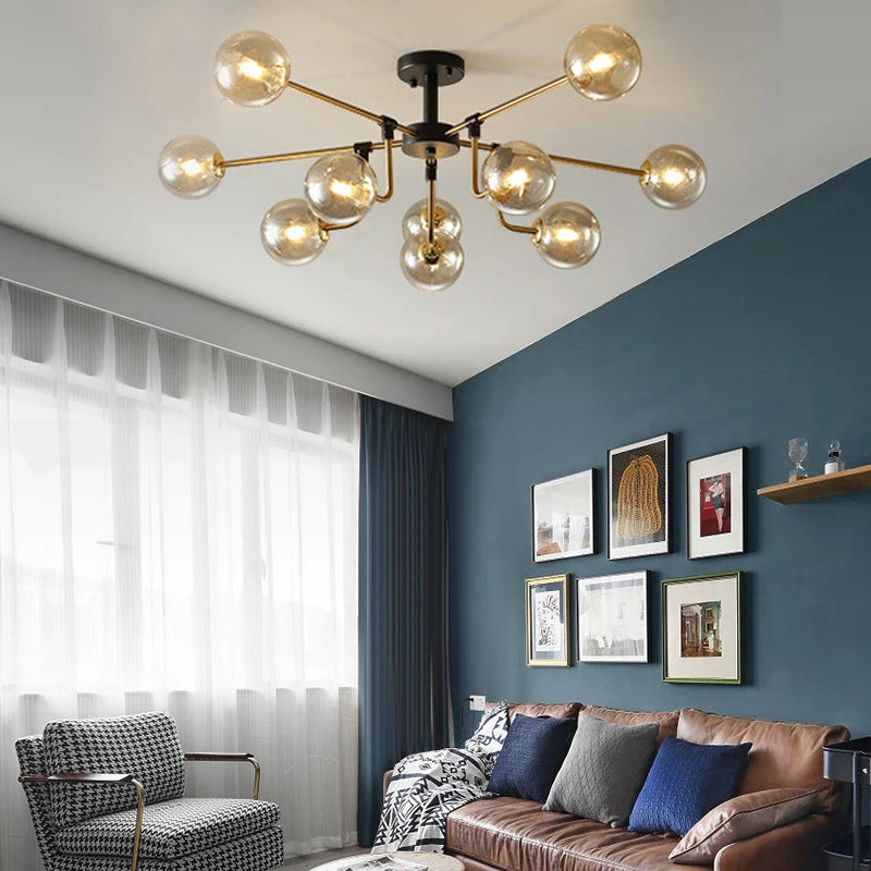 lampe suspension moderne sphères translucides structure dorée salon blanc nordique