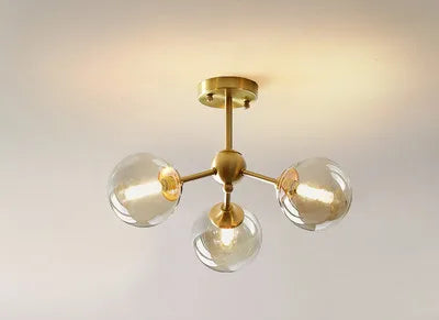 lustre moderne lumières doré sphères transparentes art déco contemporain led chambre salon