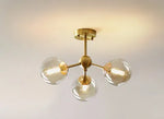 lustre moderne lumières doré sphères transparentes art déco contemporain led chambre salon