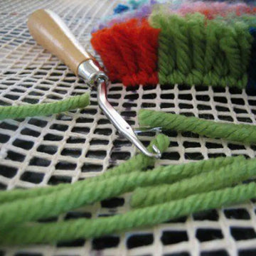 tapis tisser multicolore tissé opacité créatif artisanal vert rouge bleu noir blanc crochet fils