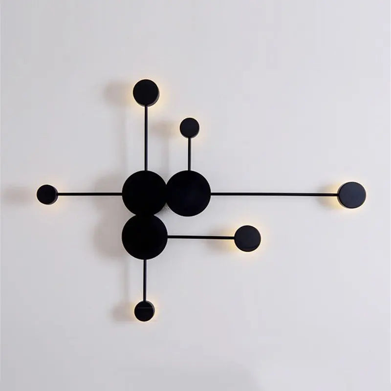 lampes murales modernes abstrait cercles tiges métalliques noir doré minimaliste têtes