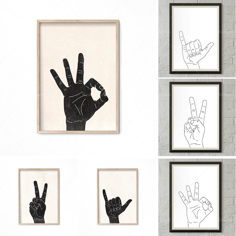 Des silhouettes noires de mains forment différents gestes sur un mur en briques blanches.