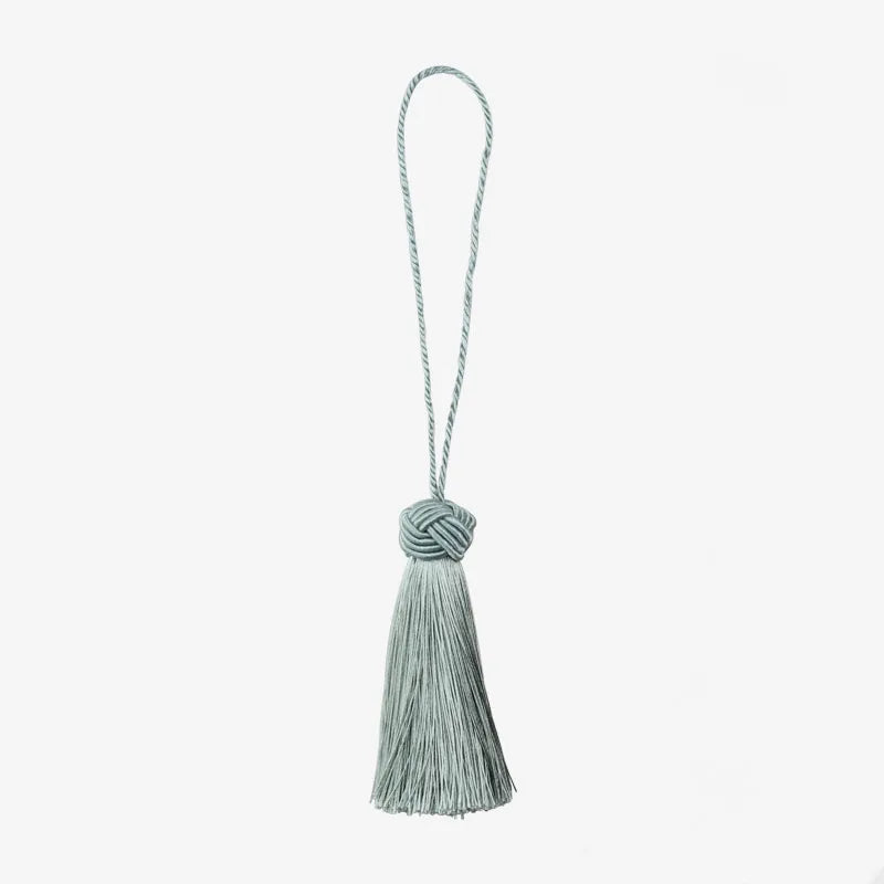 pompons franges decoration maison beige gris blanc bleu marine noir tissu élégant