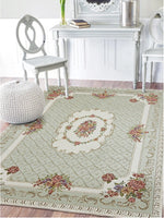 Tapis fleuri vert clair chambre
