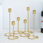supports bougie or modernes hauteur 15cm 25cm lisses motifs torsadés bougies blanches dorées composition