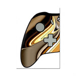Une manette de jeu aux courbes dorées et noires, avec des boutons et un design élégant et moderne.