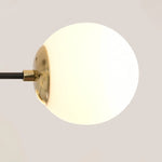 lampe suspension moderne noir doré sphères translucides led restaurant chambre salon
