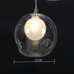 suspension lumineuse moderne verre transparent sphères simples éclairage led contemporain fixations invisibles