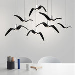 suspension lumineuse moderne oiseau stylisé noir blanc câbles opacité chambre salon