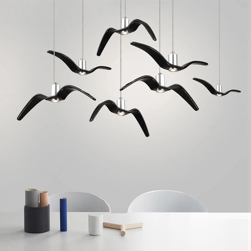 suspension lumineuse moderne oiseau stylisé noir blanc câbles opacité chambre salon