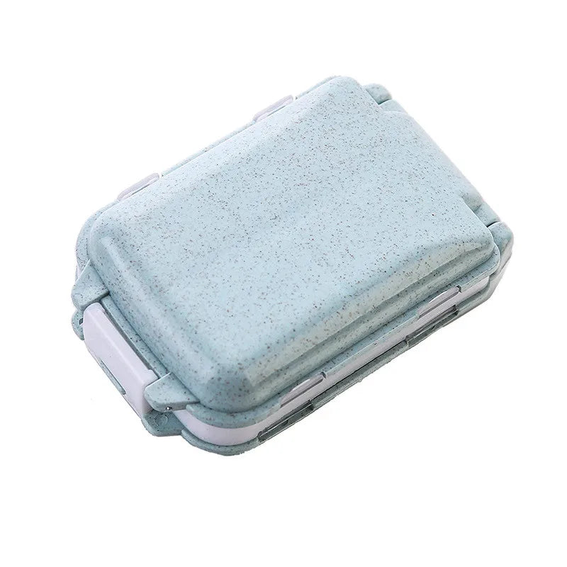 organisateur médicaments boîte pilules compartiments clips couleurs vert rose pratique compact