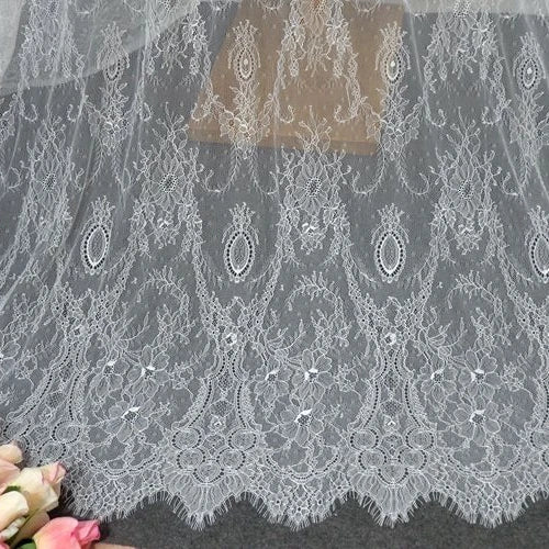 dentelle polyester nylon blanc noir ornements floraux motifs géométriques translucide classique élégant tissu large