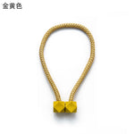 attaches rideaux décoratives modernes couleurs vives tressure cordée forme cube prismatique fixations nodales