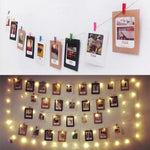 décoration photo mariage anniversaire guirlande lumineuse pinces bois cartes quadrillées vintage bohème