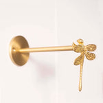 pince rideau dorée insectes anges détails sculptés quincaillerie fenêtre vintage opaques