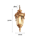 Lampe suspendue or noir verre translucide classique baroque chaîne texture métallique motif sculpté