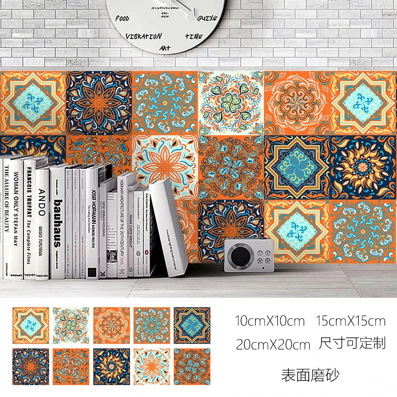 Détail du motif floral orange sur l'autocollant de carrelage