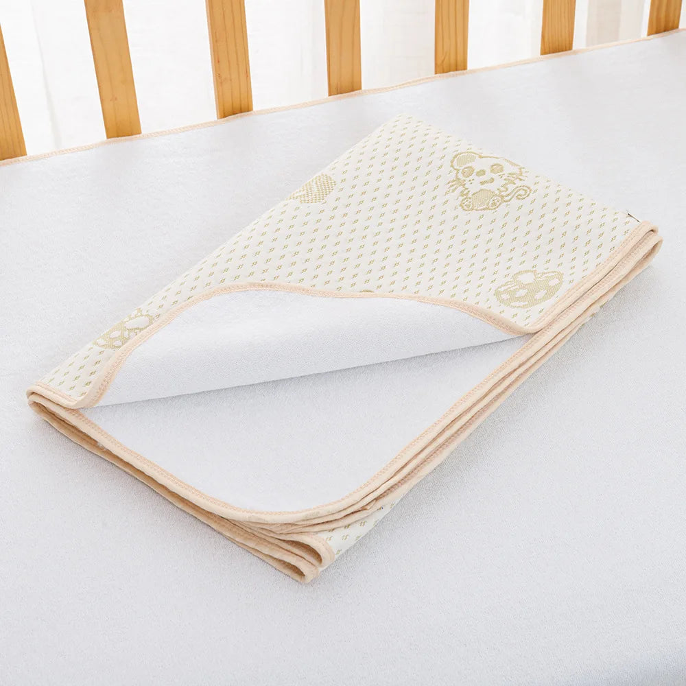 couverture bébé coton douce nuages dorés rose clair bleu clair texturée 36 mois
