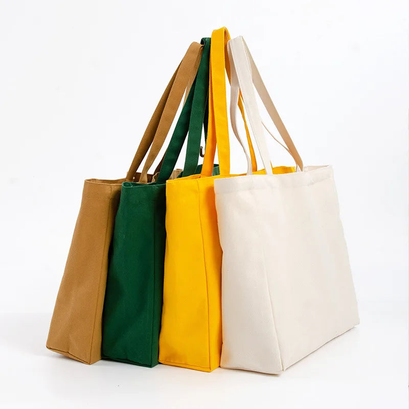 sacs shopping réutilisables couleur beige vert jaune rose orange toile respectueux environnement multifonctionnelsversible pliables