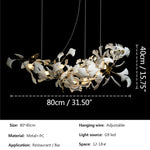 lampe suspendue feuilles gingko blanc doré contemporaine élégante salon chambre lumière chaînes porcelainière