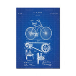 Le plan détaillé d'un vélo ancien brevété, avec ses composants techniques annotés sur un quadrillage de conception.