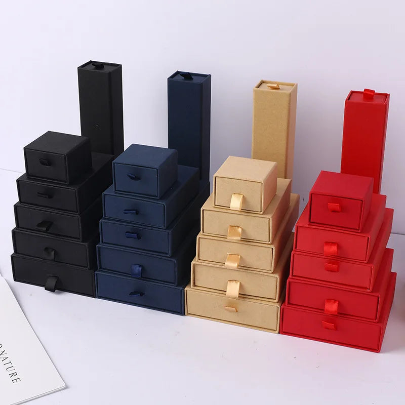 Boîte rangement bijoux en papier noir ouverte montrant l'intérieur