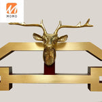 horloge murale bois chinois cadres dorés marron motif géométrique aiguilles dorées classique