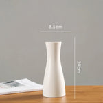 vases blancs modernes minimalistes céramique opaques fleurs artificielles table simple