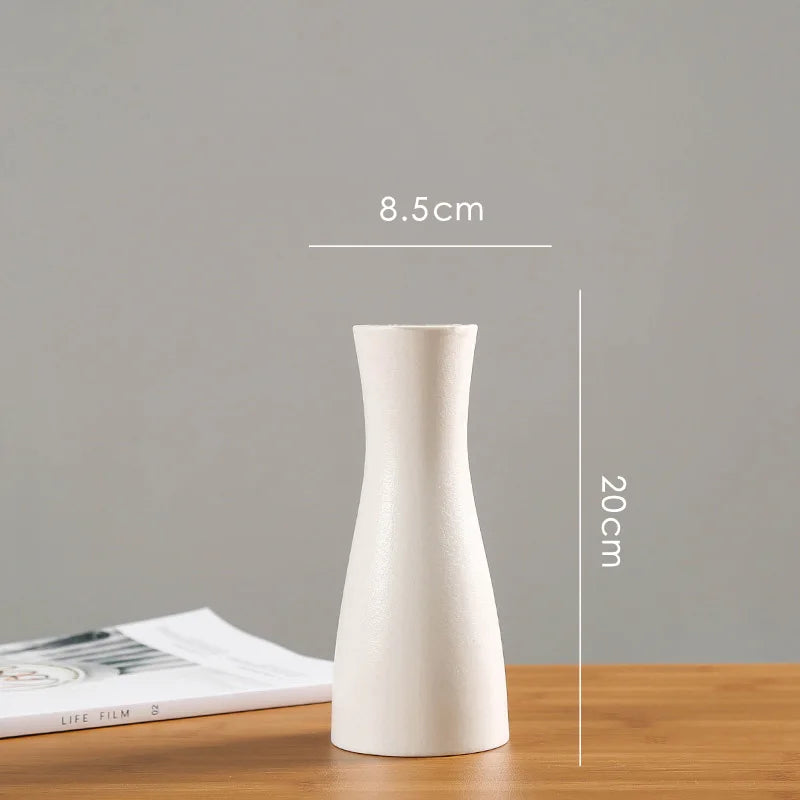 vases blancs modernes minimalistes céramique opaques fleurs artificielles table simple