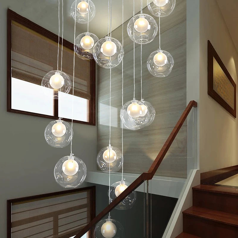 suspension lumineuse moderne verre transparent sphères simples éclairage led contemporain fixations invisibles