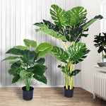décoration extérieure plante artificielle verte moderne grande feuilles pot noir exposition sol festive